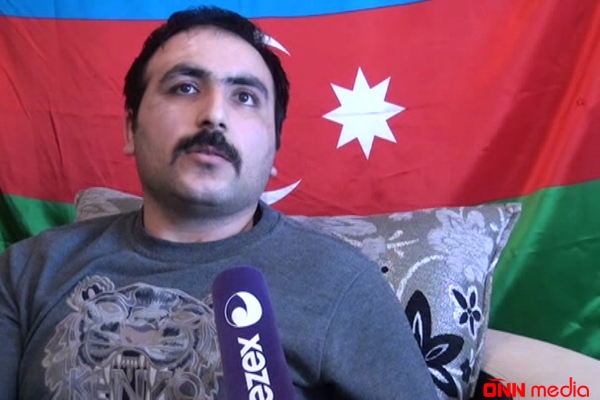 Aprel döyüşçüsü xaricdə müalicədən sonra təntənəli qarşılandı-VİDEO