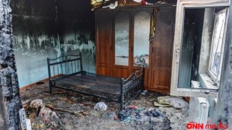 Azərbaycanda DƏHŞƏT: Qonşu qadının başını kəsib evini yandırdı