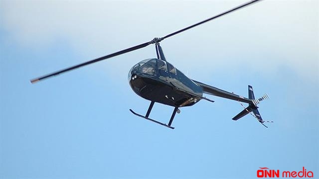 Polis vertolyotu körfəzə düşdü